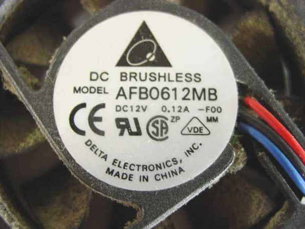 Close-up of Delta Electronics AFB0612MB DC brushless fan label showing model number, DC 12V 0.12A rating, CE, UL, VDE certifications, and Made in China markings