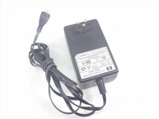 HP 0950-4392 AC Power Adapter — top view showing body, US AC plug, and 3-pin output connector with cable