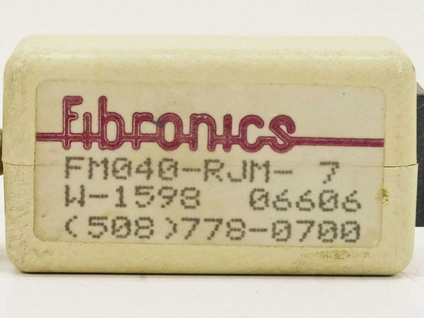 Fibronics FM040-RJM-7 adapter – bottom label close-up showing model FM040-RJM-7, part number W-1598, and code 06606