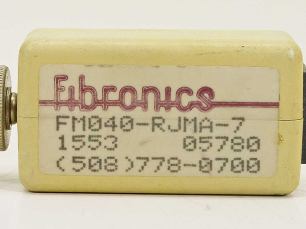 Fibronics FM040-RJMA-7 – top label view showing FM040-RJMA-7 model number, date code 1553 05780, and Fibronics branding