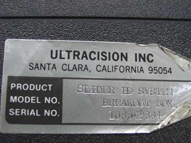 Ultracision Inc nameplate label showing product name Slider ID System Breakout Box and serial number 103049301, Santa Clara CA