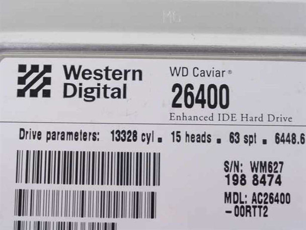 Western Digital AC26400 WD Caviar Enhanced IDE hard drive – close-up of top label showing model AC26400-00RTT2, drive parameters, and serial number