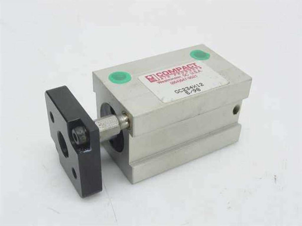 Compact Air Products GC234X12 Pneumatic Guided Block Cylinder – front and side view showing aluminum body, black front mounting plate with four bolt holes, center rod, and green port plugs on top