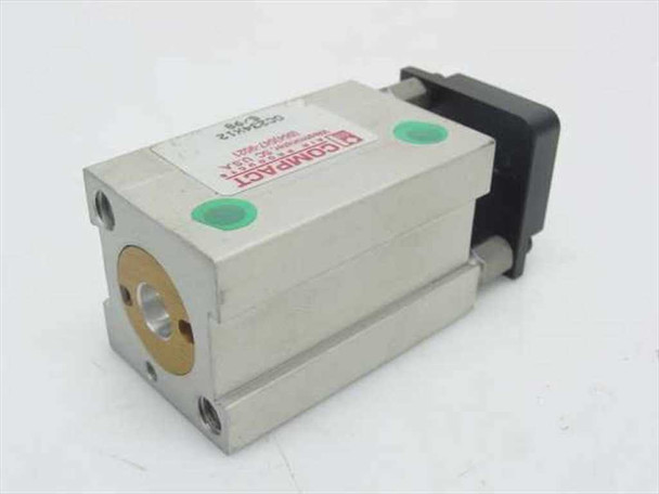 Compact Air Products GC234X12 Guided Block Cylinder – rear end view showing gold-colored bore opening, black rear mounting block, green port plug, and Compact logo label with date code 8/96