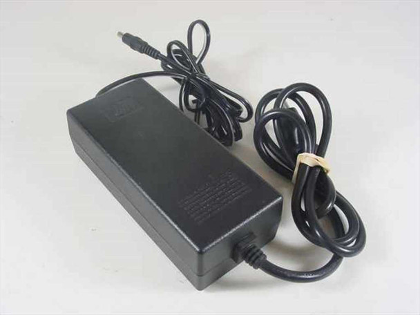 HP 0950-4483 AC/DC power adapter with attached AC power cord — front and side view showing black brick body and barrel plug output