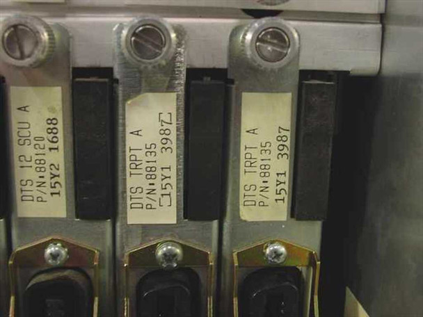 Card labels showing DTS 12 SCU A (P/N 88120) and DTS TRPT A trunk protector cards (P/N 88135) installed in chassis