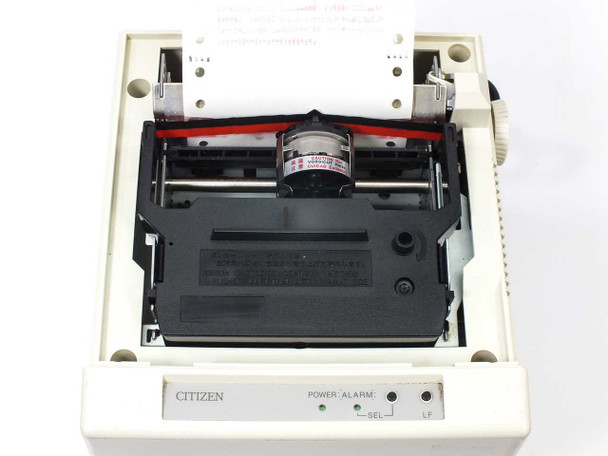 Citizen CBM iDP3535 printer interior – dot matrix print head with ribbon cartridge installed, front panel with POWER, ALARM, SEL, and LF controls