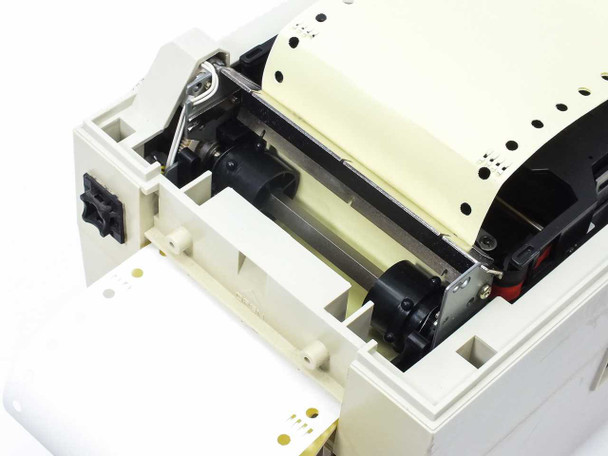 Citizen CBM iDP3530 open interior detail – tractor feed roller mechanism, paper path, and sprocket drive assembly
