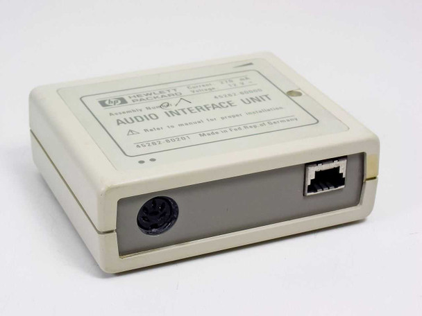 HP 45262-80201 Audio Interface Unit – angled view showing rear mini-DIN port and RJ connector