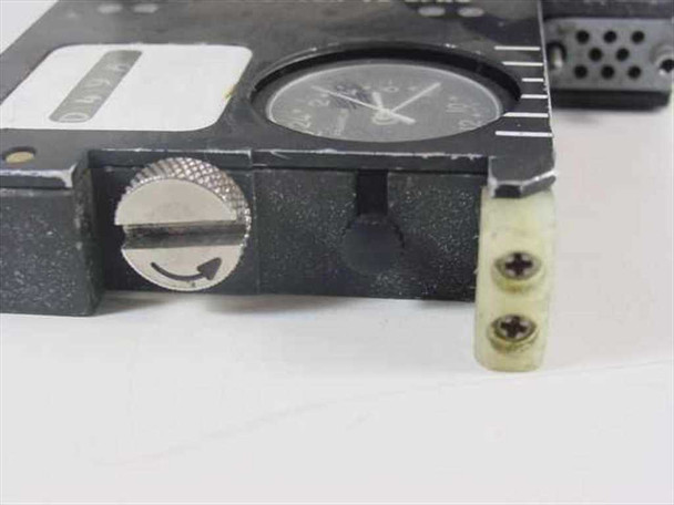 GE 7321-400-3 Military Film Magazine – detail of winding knob, Franklin clock face, and small electrical connector block