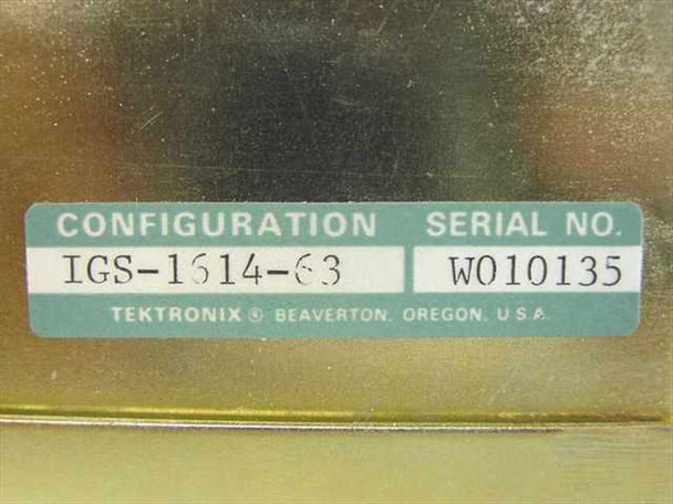 Tektronix IGS-1614-63 configuration label showing model IGS-1614-63 and serial number W010135, manufactured in Beaverton Oregon USA