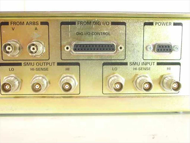 Tektronix IGS-1614-63 rear panel detail showing From ARBS connectors, DIG I/O Control DB25 connector, Power DB15 connector, SMU Output and SMU Input BNC connector banks