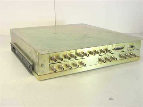 Tektronix IGS-1614-63 I/O Trigger Interconnect Control Module – three-quarter front view showing BNC connectors across front panel in metal enclosure