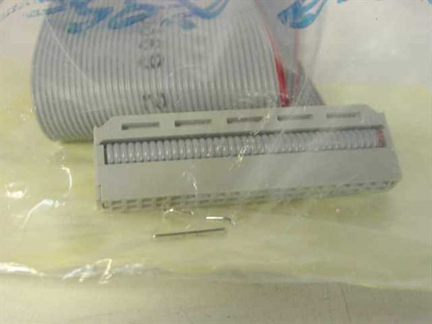 Ultratech Stepper 0509-285400 cable extension connector end and small pin detail visible inside bag