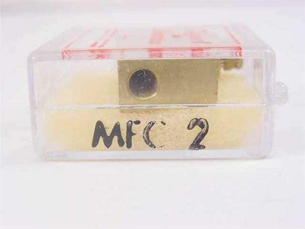 Clippard MFC-2 Minimatic valve in open clamshell case, front view showing brass valve body in foam insert with MFC 2 handwritten on foam