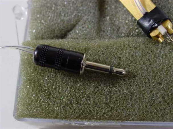 Close-up of ERS-32-55-TC transducer tip and black knurled connector end with lead wires