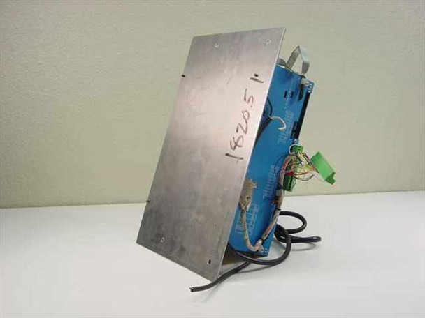 Anaheim Automation DPY65352 – angled right-side view showing rear mounting plate with handwritten asset number and green terminal connector