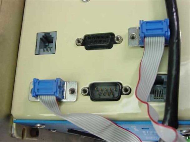 Anaheim Automation DPY65352 – rear panel showing RJ connector, two DB9 connectors with blue ribbon cable assemblies, and partial enclosure view