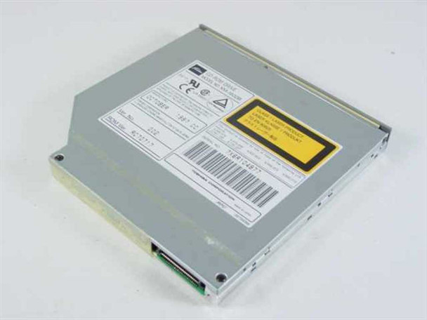 Toshiba XM-1602B slim notebook CD-ROM drive — angled top/side view showing label detail, tray front, and ATAPI connector end