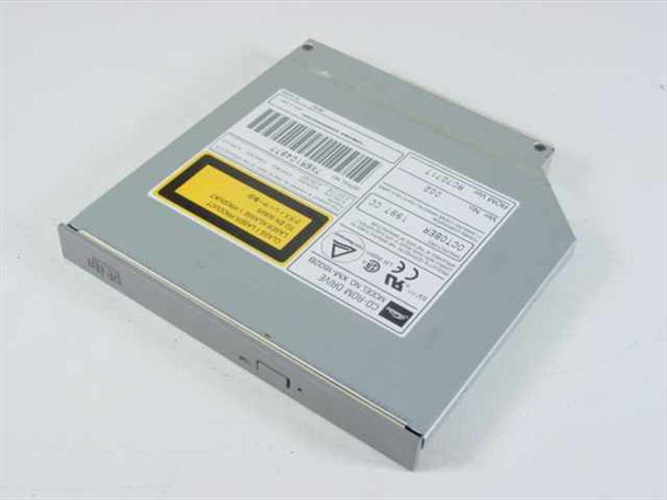 Toshiba XM-1602B 20X notebook ATAPI CD-ROM drive — top view showing label with model number, barcode, and yellow Class 1 laser warning sticker