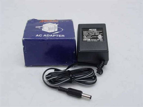 Mode Electronics DV-6500 AC Adapter with original box – front view showing unit and packaging