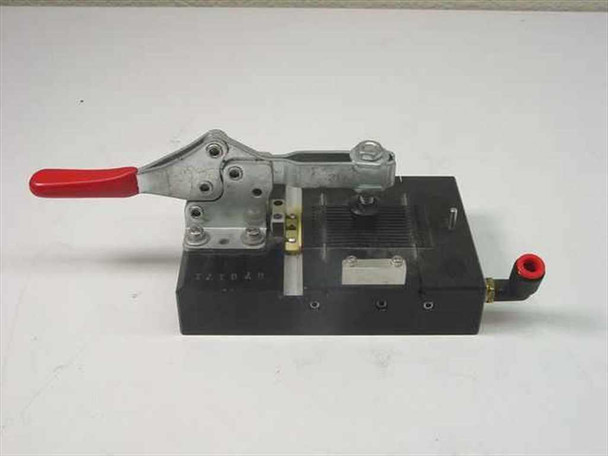 Pneumatic toggle clamp fixture assembly – right-side view showing toggle clamp mechanism, brass hardware, and opposite-side push-in fitting