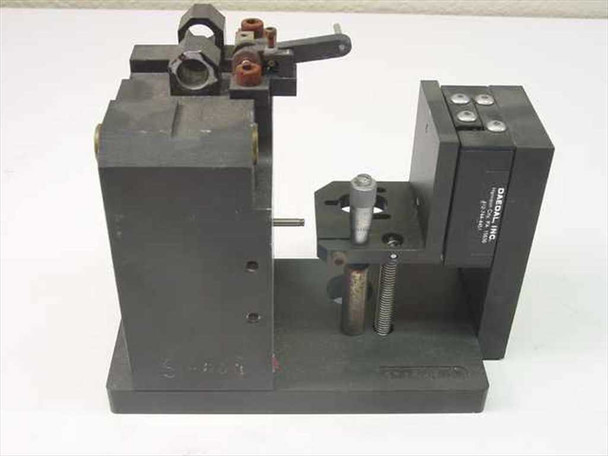 Daedal linear slide custom inspection assembly – rear-right three-quarter view showing Daedal label on slide block, threaded lead screw, and clamping fixture detail
