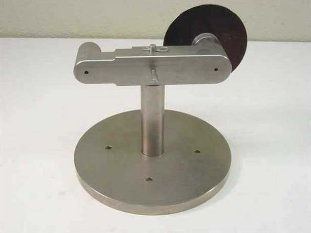 Custom Scientific stainless steel component holder stand — rear-left view showing reverse side of pivot arm assembly, locking thumbscrew detail, and three-hole round base