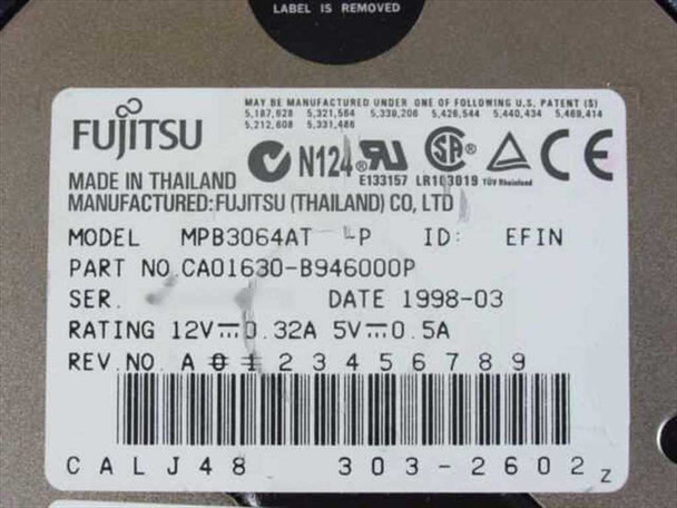 Fujitsu MPB3064AT drive label showing model, part number CA01630-B946000P, date 1998-03, and 12V/5V ratings