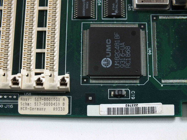 NCR 517-0001001 close-up of UMC UM82C481BF chipset and board label showing Assy 517-0001001 A, Schm 517-0000459 B, NCR-Germany A9330