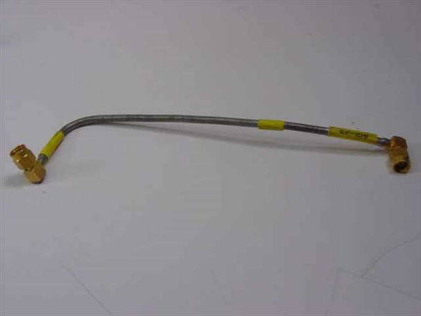 Single flexible SMA male right-angle RF coaxial cable approximately 8 inches long showing both connectors and yellow cable jacket