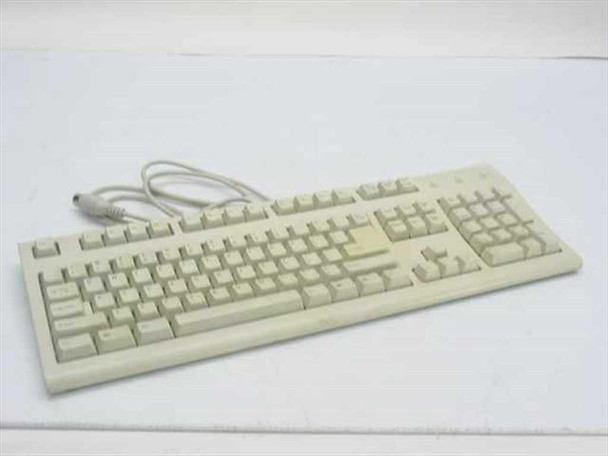 Acer 6511-TW PS/2 full-size keyboard – top view showing cream-colored keys and attached PS/2 cable