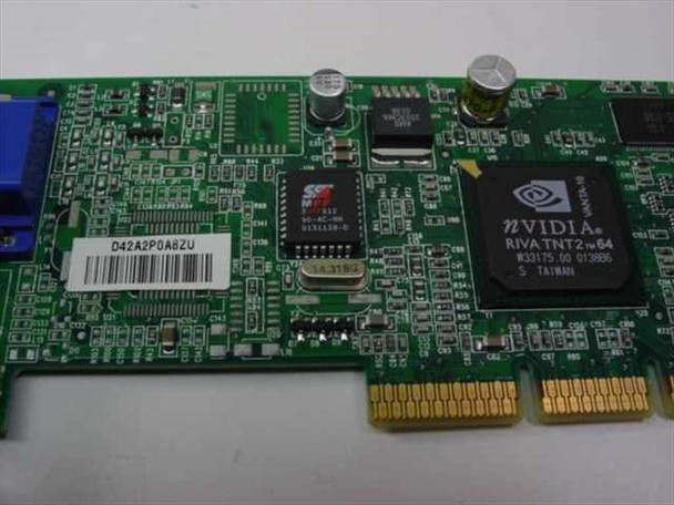 Compaq 239920-001 NVIDIA RIVA TNT2 M64 chip close-up – label reads RIVA TNT2 m64 M33175 00 013006 Taiwan, with board serial D42A2P0A8ZU sticker