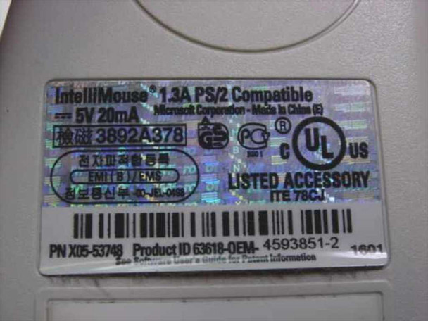 Microsoft IntelliMouse X05-53748 bottom label showing PN X05-53748, Product ID 63618-OEM, 5V 20mA, PS/2 Compatible, Made in China