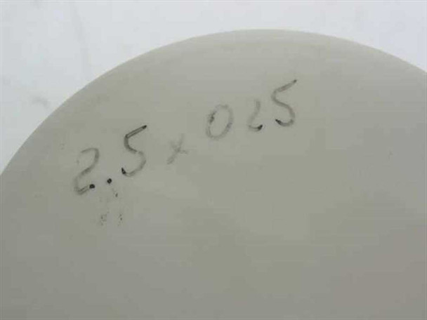 Ceramic body of spindle chuck with hand-engraved size marking '2.5 x 025' visible on surface — detail view