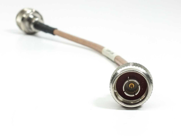 Opposite end view of ESM Cable Corp RGS-400 coaxial cable showing second male N-type connector face with center pin