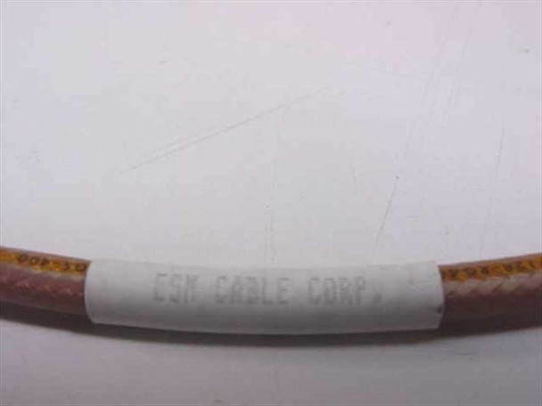 ESM Cable Corp label on RG-400 coax cable mid-section — white label reading ESM CABLE CORP