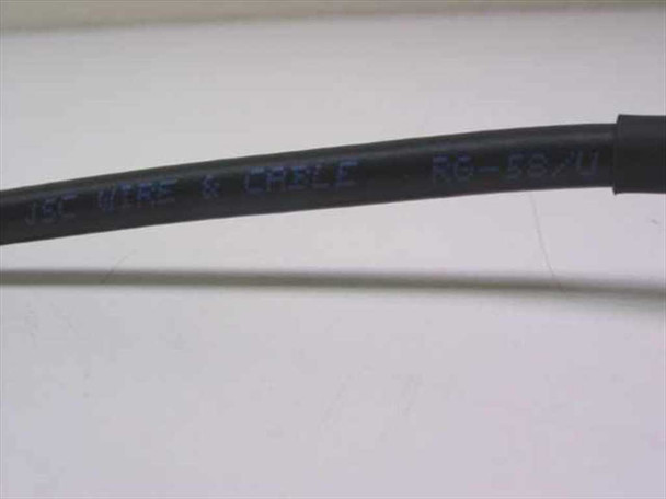 JSC Wire & Cable RG-58/U markings printed on black cable jacket — brand and cable type visible