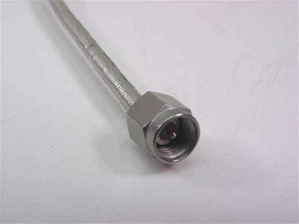 Harbour Industries 200086-014 close-up of straight male SMA connector with stainless steel hex body and center pin