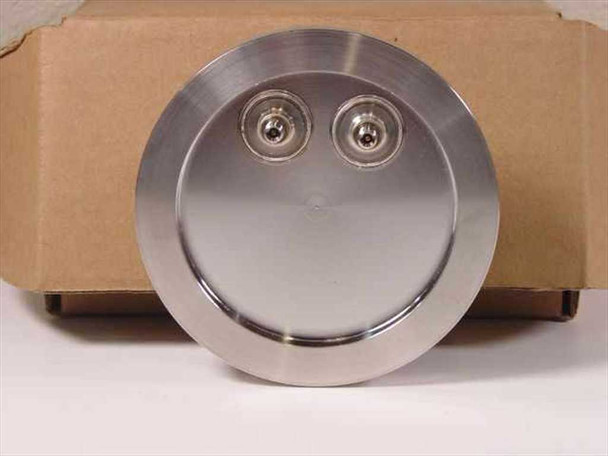 Omni Cap 101192-0027 vacuum chamber fill port lid — top-down view showing two centered feedthrough port fittings on smooth machined aluminum flange surface