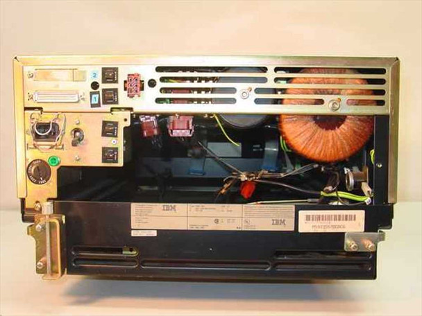 IBM 9335-B01 interior/bottom view showing toroidal transformer, internal wiring, IBM-labeled drive bays, and rear interface connectors