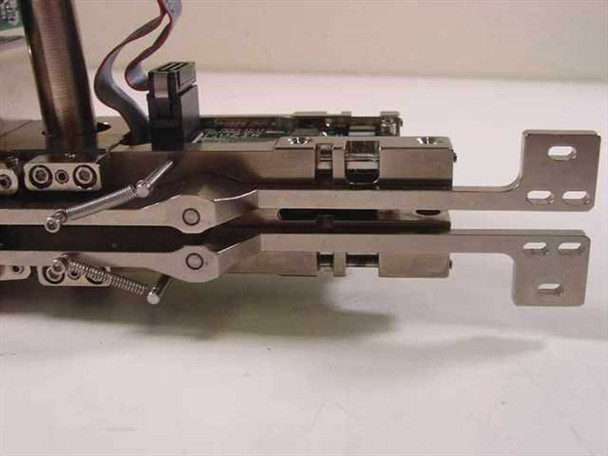Guzik 304000 2202 – close-up of precision stainless steel dual-rail linear slide and clamping mechanism