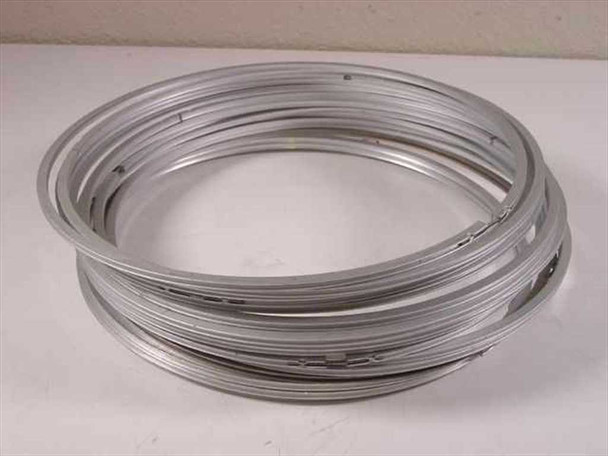 Stack of multiple 9-inch metal ring clamp flange gaskets coiled together, showing available lot quantity