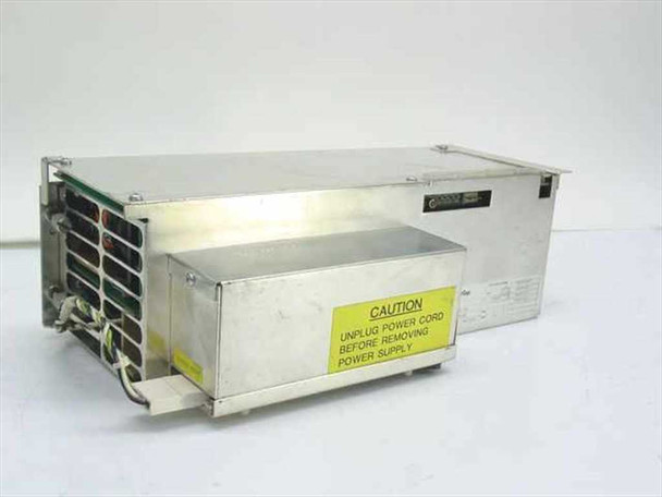 MAI Basic Four 4114 Power Supply 907897-001 – front/side view showing aluminum enclosure with ventilation fins and caution label
