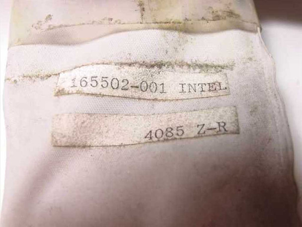 Fabric accessory bag with label showing Intel part number 165502-001 and date code 4085 Z-R