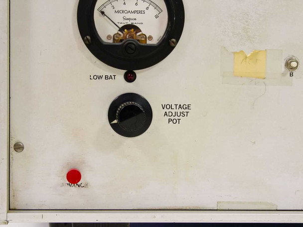 DT1448 lower panel detail showing Simpson microammeter, Low Bat indicator LED, and Voltage Adjust Pot knob