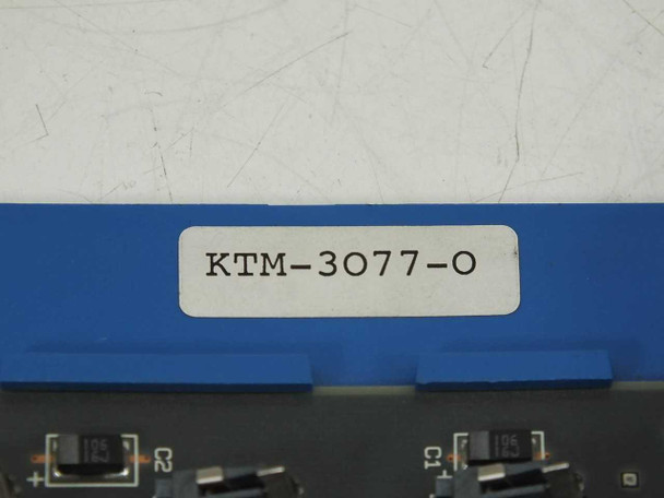 Close-up of KTM-3077-0 part number label on blue card bracket