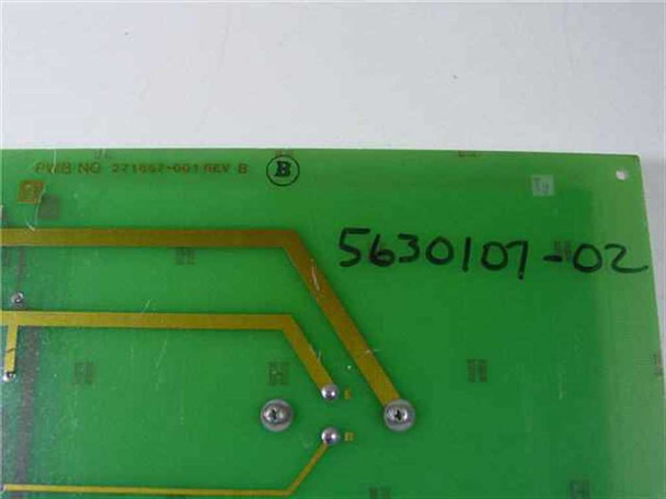 Dataproducts Regulator Assy 261564-001 — solder side of PCB showing P/N 5630107-02 handwritten in marker and PWB No. 321552-001 Rev B printed label