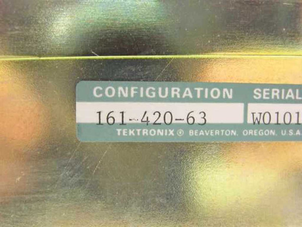 Tektronix 161-420-63 configuration label closeup — reads Configuration 161-420-63, Serial W0101, Tektronix Beaverton Oregon USA