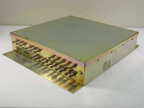 Tektronix 161-420-63 I/O Trigger Interconnect Module in IGS-1614-63 enclosure — three-quarter front/side view showing BNC connectors along front edge